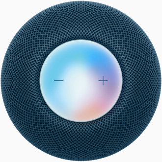 En blå HomePod mini set fra oven med plus- og minusknapper til at justere lydstyrken på et farverigt display.