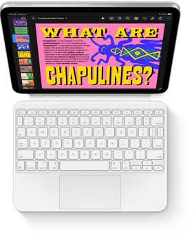Näkymä ylhäältä alaspäin iPadista liitettynä valkoiseen Magic Keyboard Folioon.