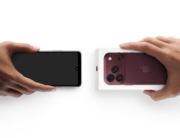 Two hands side-by-side, hand holding Android without box, trade-in, with hand holding new iPhone 18 Pro box
