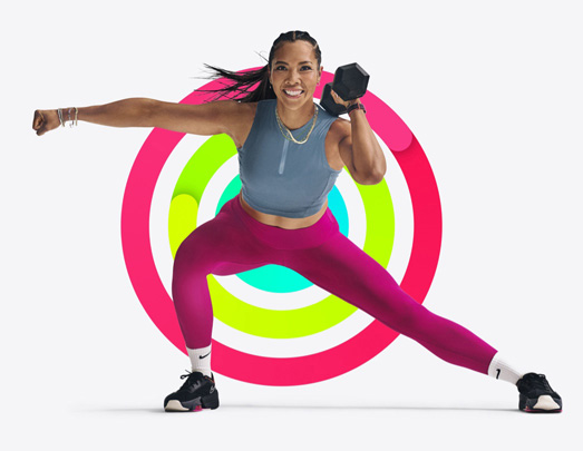 A person lifts weights in a side lunge position, Activity rings form background graphic